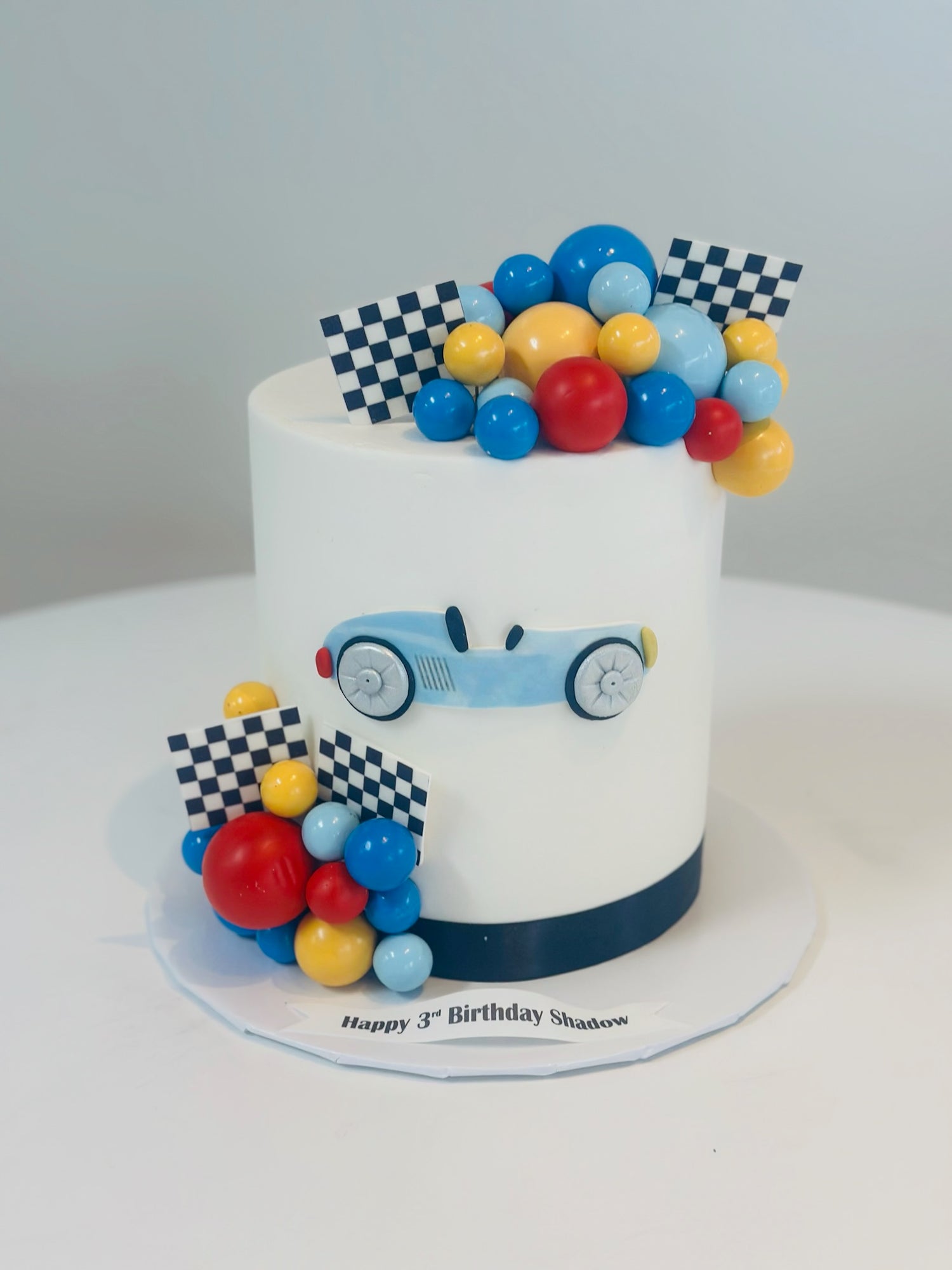 Tall Vintage Race Car Cake