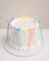 Buttercream Cake with Rainbow Hearts and Bows