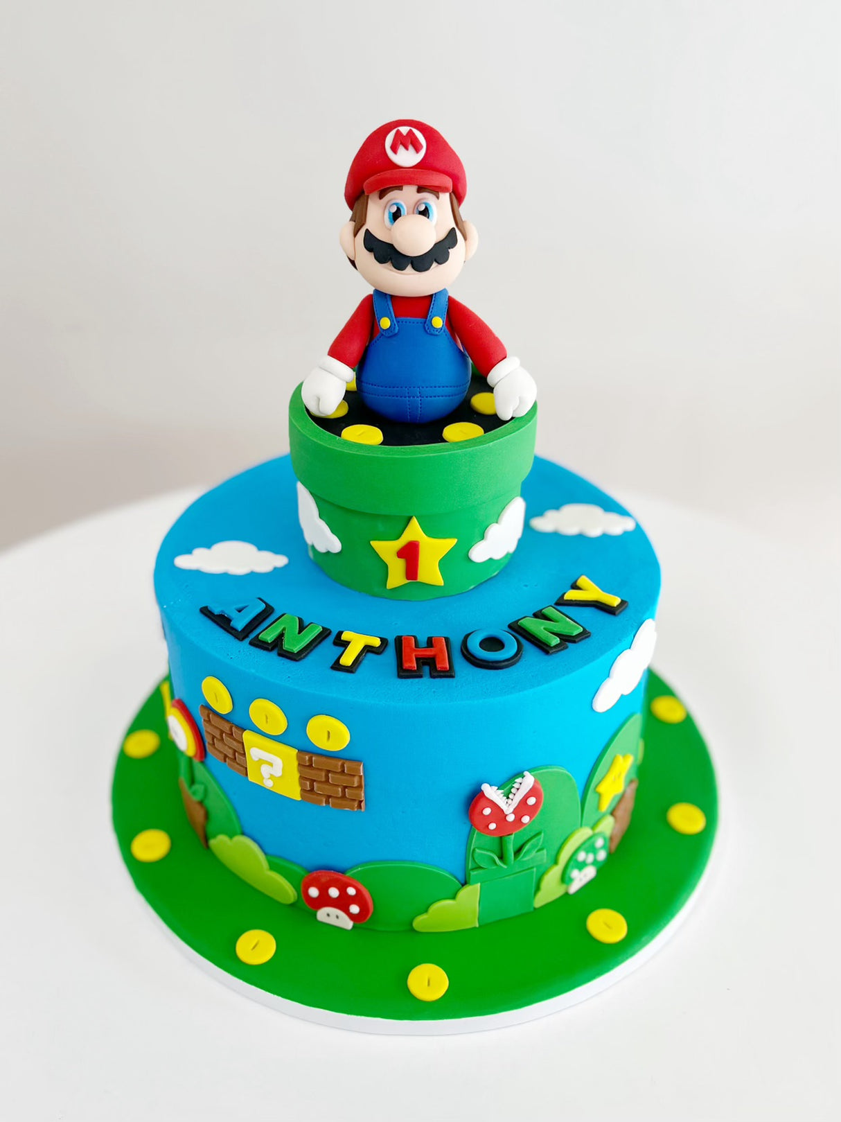 Customized Cake (Super Mario Design with Buttercream, Sculpted Topper, and Fondant Accents Pizza Board)